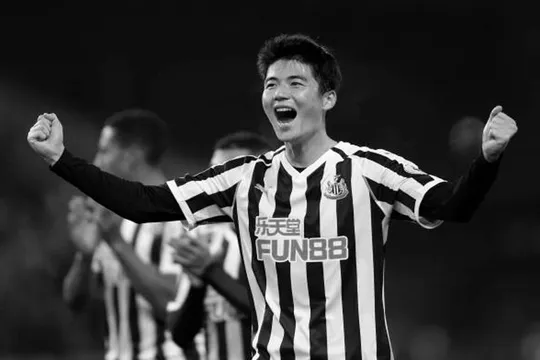 Ki Sung-yueng celebrates with fans following Newcastle United's 2-1 victory over Burnley in the Premier League.