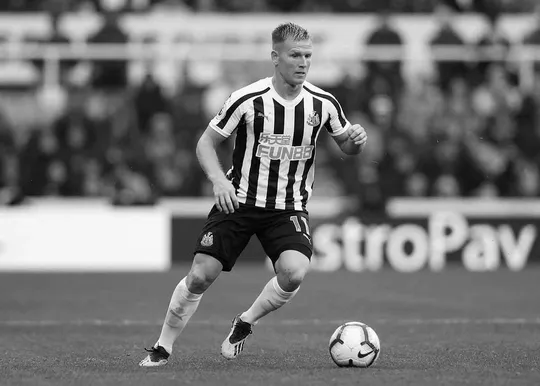 Matt Ritchie in action for Newcastle against Chelsea at St. James' Park.