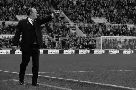Rafa Benitez issues instructions to his players as Newcastle United take on Manchester United at St. James' Park.