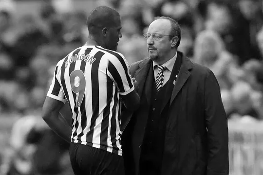 Salomon Rondon embraces Newcastle United manager Rafa Benitez.