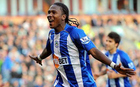 Hugo Rodallega celebrates scoring for Wigan against Blackpool