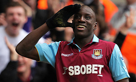 Demba Ba celebrates after scoring for West Ham in the Premier League