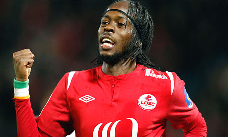 Gervinho celebrates scoring for Lille during a Ligue 1 game 