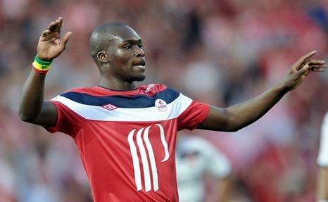 Moussa Sow celebrates after scoring a goal for Lille