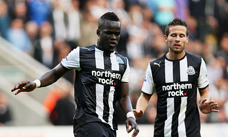 Cheik Tioté and Yohan Cabaye in action for Newcastle United in St.James' Park