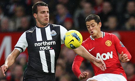 Newcastle United's Steven Taylor battles with Javier Hernandez of Manchester United