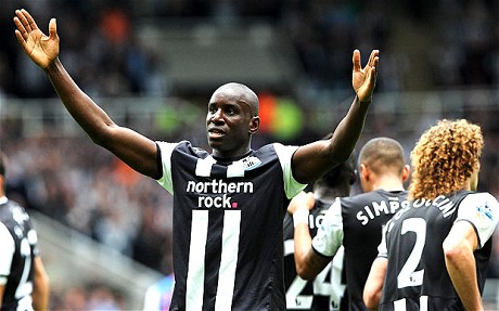 Demba Ba celebrates after completing his hattrick at St.James’ Park