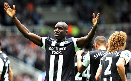 Demba Ba celebrates after completing his hattrick at St.James' Park