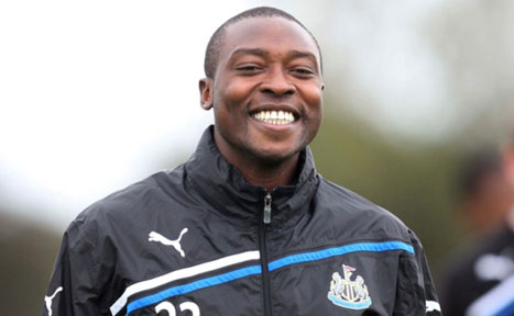 Shola Ameobi smiling at a Newcastle United training session