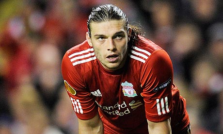 Andy Carroll takes a breather during a match for Liverpool