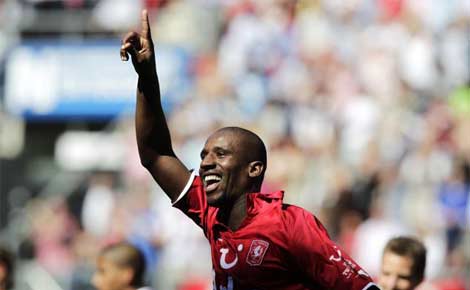 FC Twente's Douglas celebrates after scoring from the Dutch side