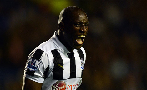 Demba Ba celebrates after scoring his second goal against Everton