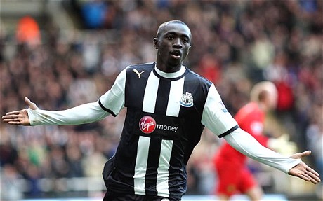 Papiss Cissé celebrates after scoring for Newcastle United against Norwich