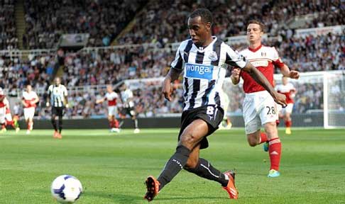 Vurnon Anita in action for Newcastle United against Fulham in the Premier League