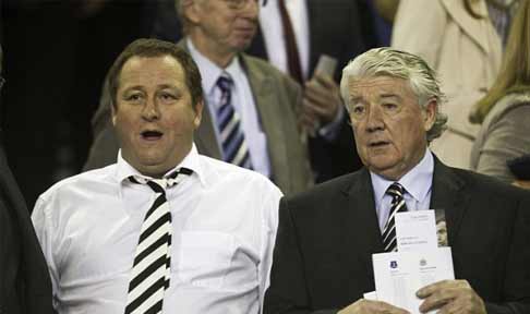 Mike Ashley and Joe Kinnear sit in the stands watching Newcastle United