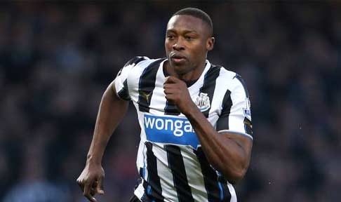 Shola Ameobi in action against Manchester City