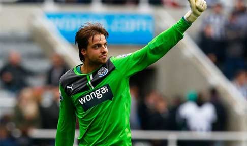 Tim Krul waves to fellow teammates during Newcastle's encounter with Manchester City