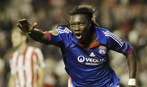 Bafetimbi Gomis celebrates scoring for Lyon