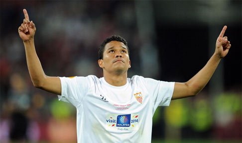 Carlos Bacca celebrates after scoring for Sevilla