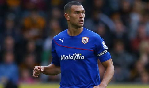 Steven Caulker in action for Cardiff City in the Premier League