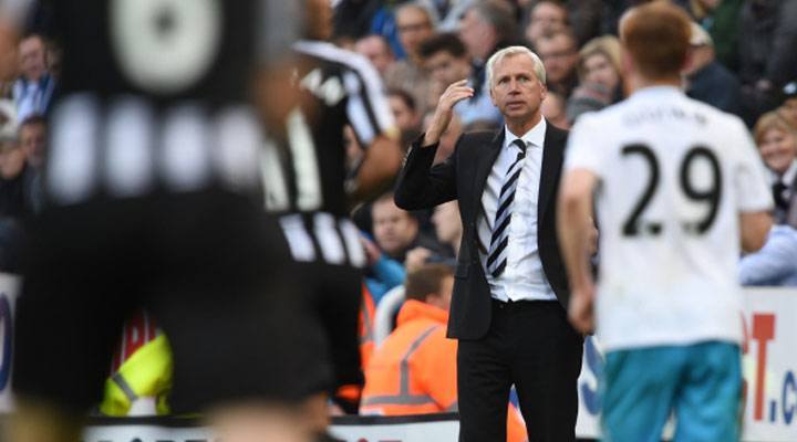 Alan Pardew paints a distressed figure on the sideline at St. James' Park