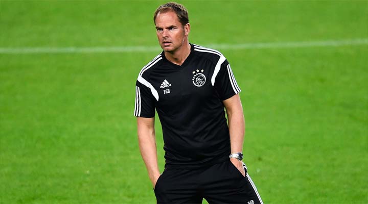 Frank De Boer watches his Ajax side warm-up against Barcelona