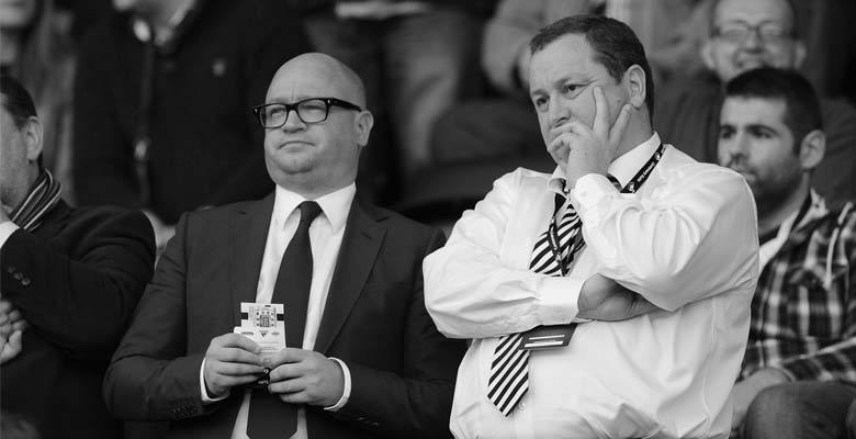 Lee Charnley and Mike Ashley look on during a Premier League game